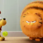 Odie and Garfield (voiced by Chris Pratt) in THE GARFIELD MOVIE.